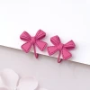 桃紅塗鴉蝴蝶結&times;蚊香盤U型耳夾-第1張