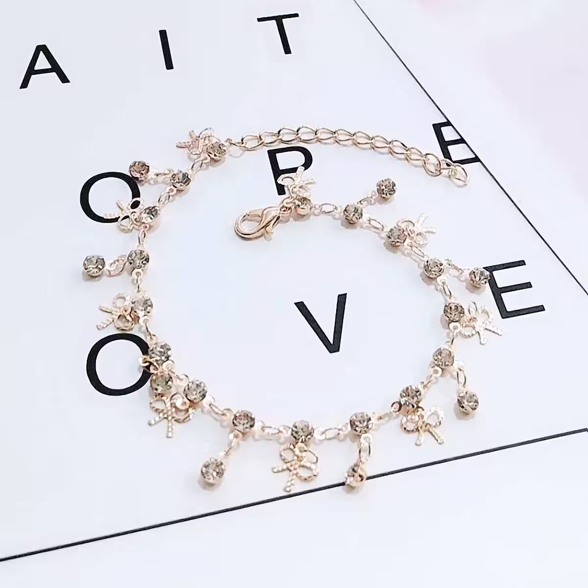 蝴蝶結閃鑽流蘇裙&times;腳鍊-第1張