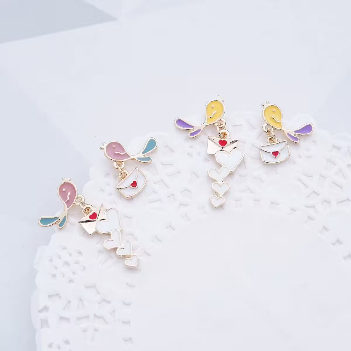 捎來幸福的送信鳥×不對稱吊墜耳環×共二色-第1張