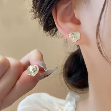 愛心貓眼石鑲花×耳環.avif