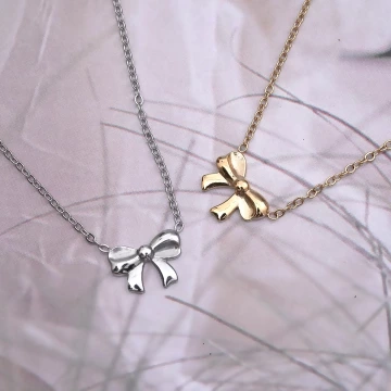 316鋼飾×禮物蝴蝶結×鎖骨項鍊×金色.avif