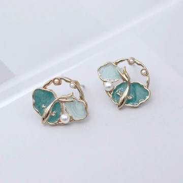 水藍海星貝殼&times;不對稱蚊香盤U型耳夾.avif