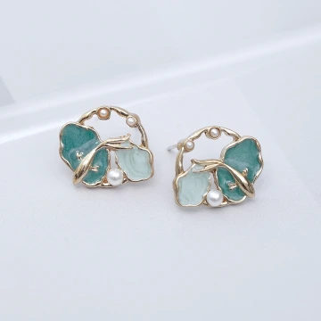 水藍海星貝殼&times;不對稱蚊香盤U型耳夾.avif